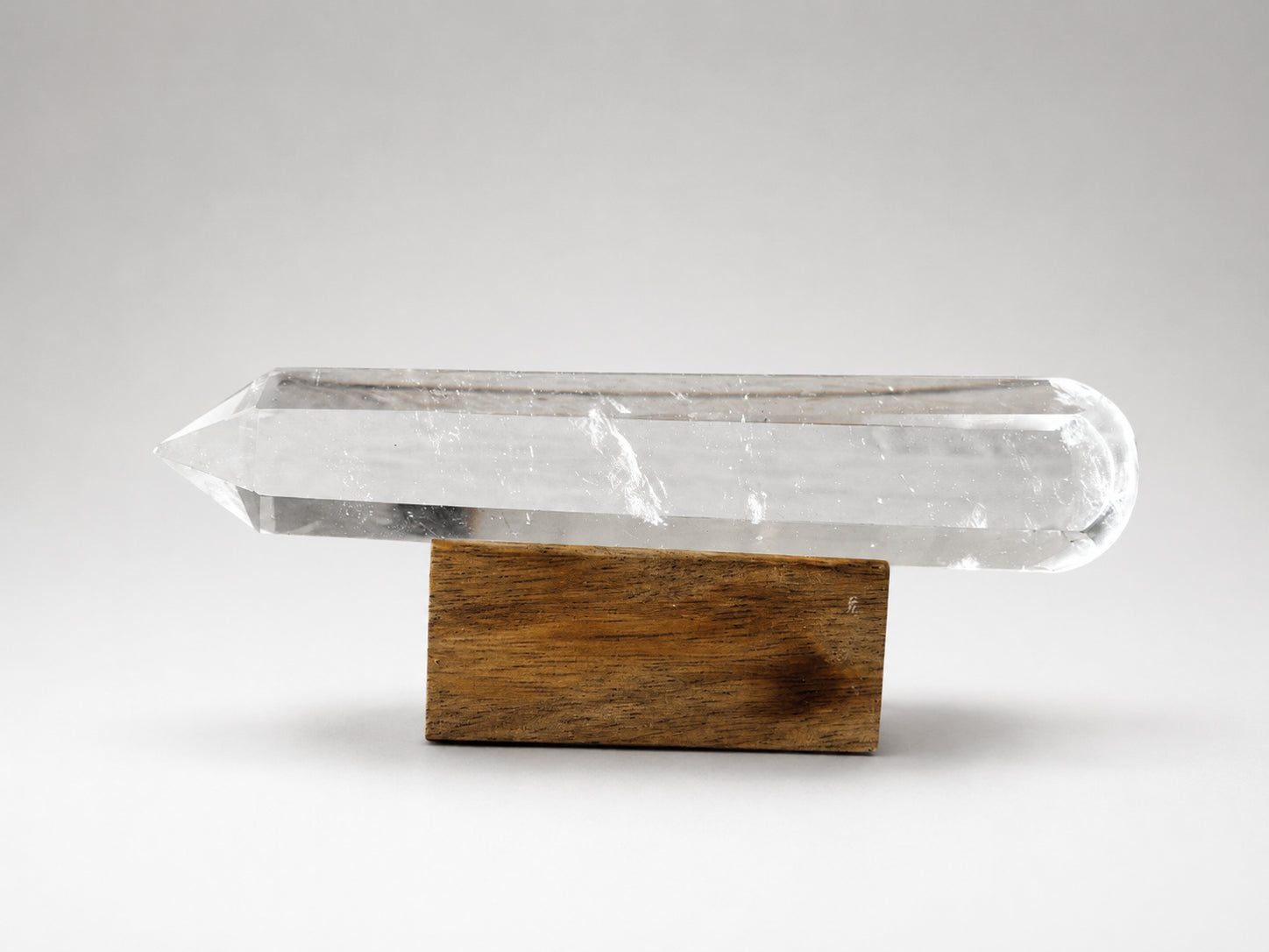 Clear Quartz Assemblage Point Healers Wand on Wooden Stand