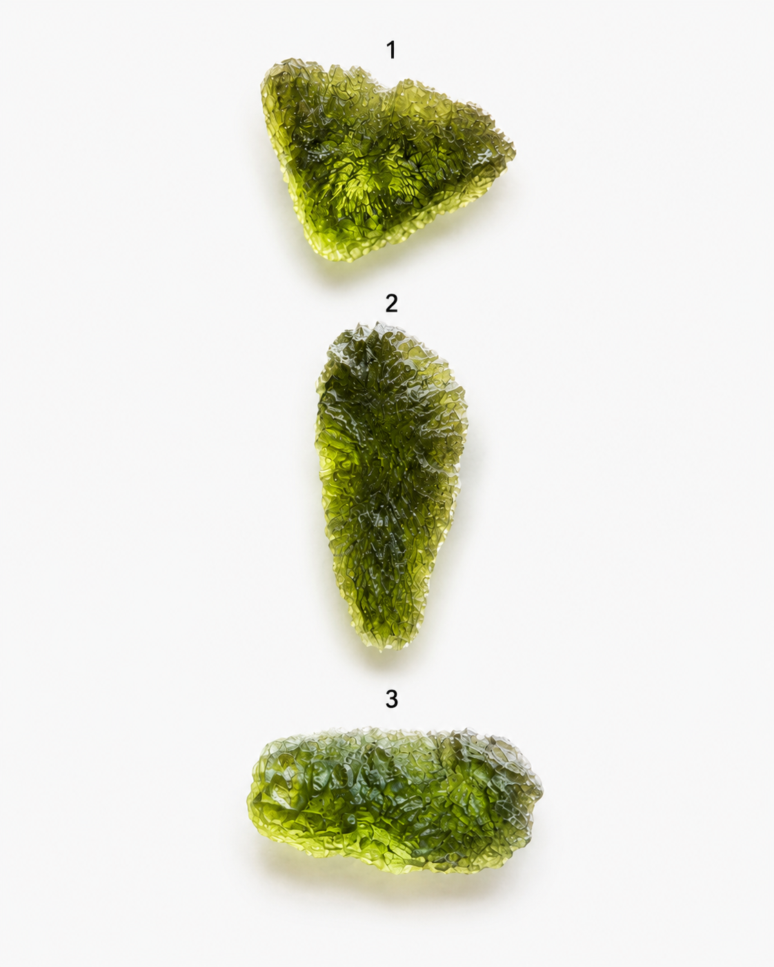 All three genuine Czech moldavite pieces side by side, numbered 1-3