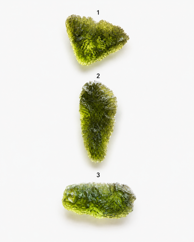 All three genuine Czech moldavite pieces side by side, numbered 1-3